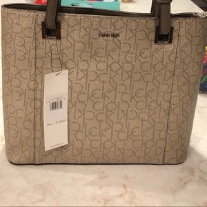 CK signature Champagne/metallic tote